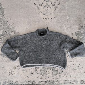 Gray mockneck sweater with silver trim